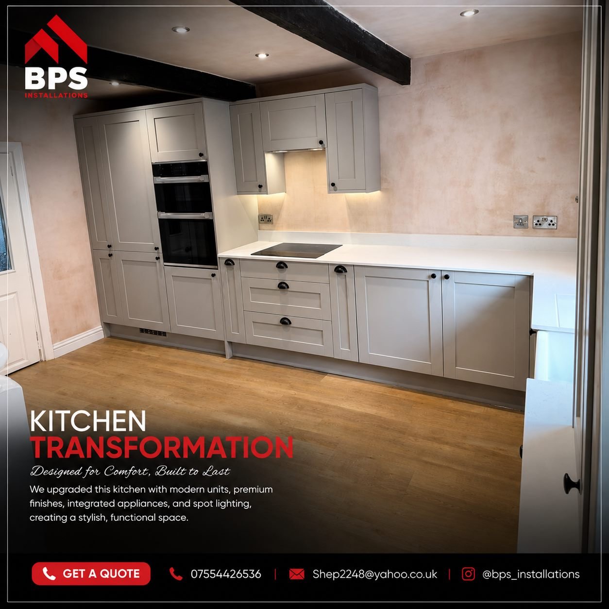 Grey shaker kitchen with exposed ceiling beam and integrated double oven